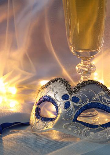 Venetian Mask with Glass of Champagne