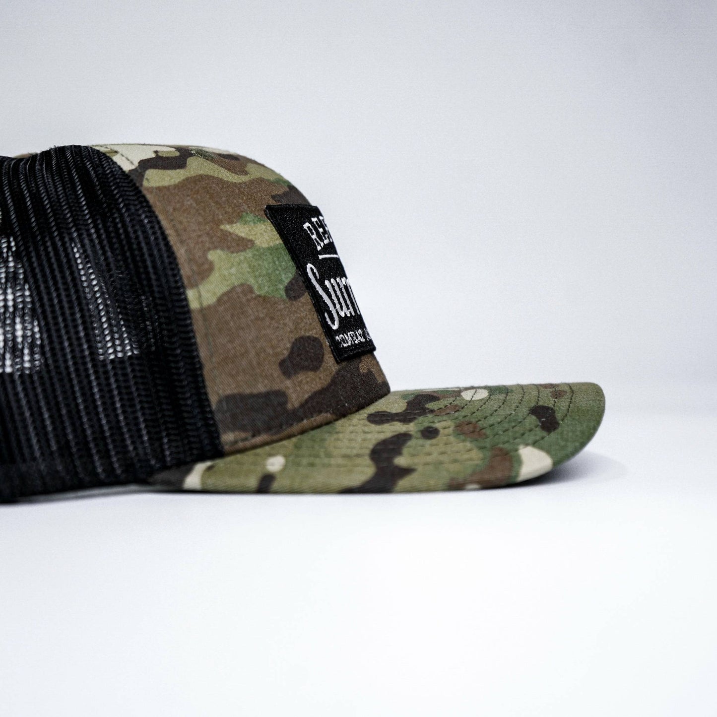 REFUSE TO SURRENDER BLACK/WHITE PATCH MID-PROFILE MESH SNAPBACK