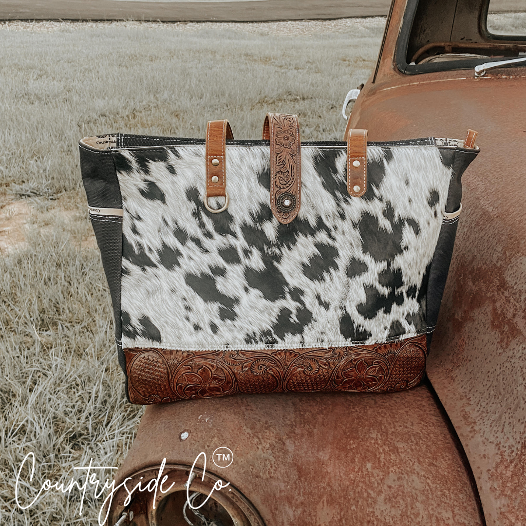 Darby Cowhide Carry All Bag by Countryside Co. Overnight bag, Computer bag