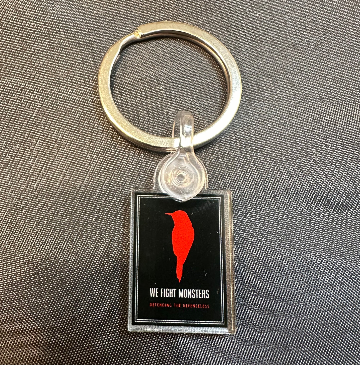 We Fight Monsters Logo 1” Keychain