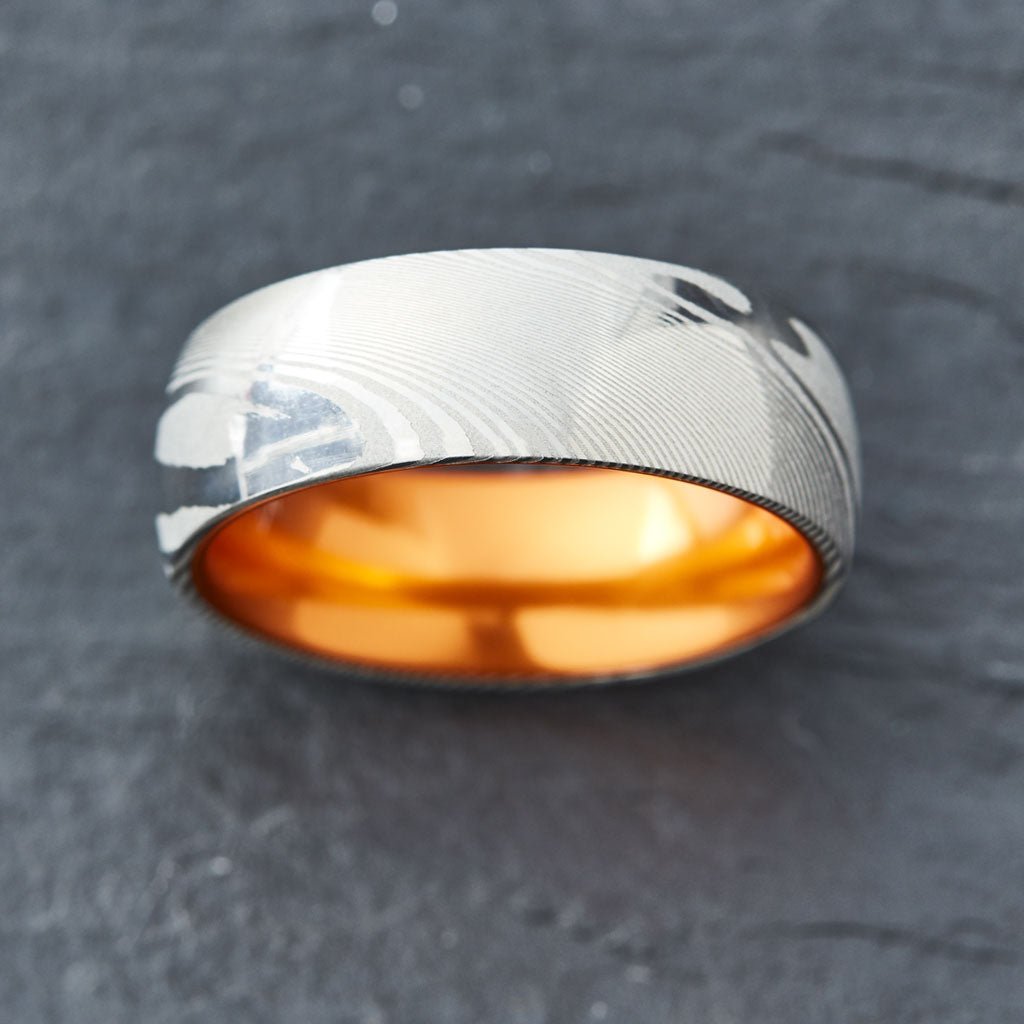 Wood Grain Damascus Steel Ring - Resilient Orange