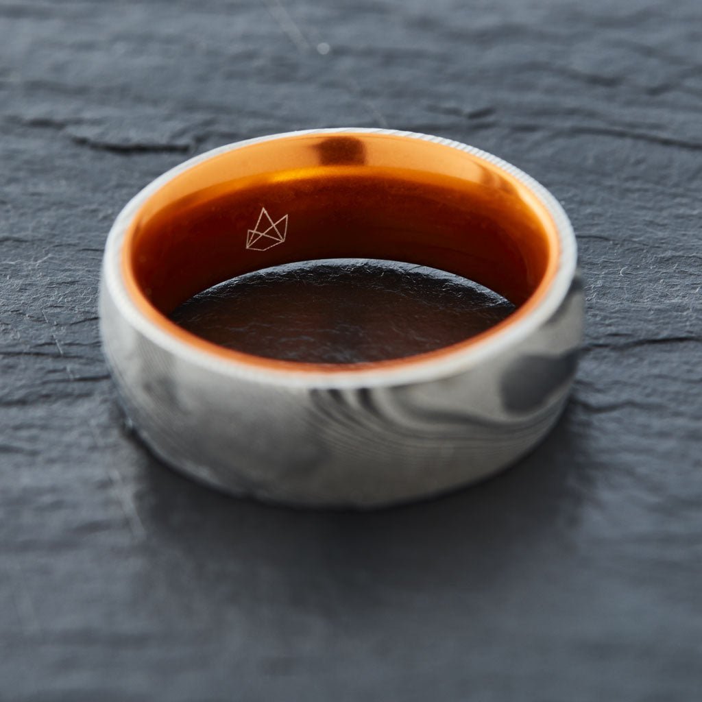 Wood Grain Damascus Steel Ring - Resilient Orange