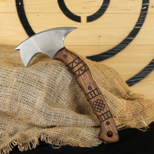 Forged tomahawk "Skaldrun" with tribal engraving