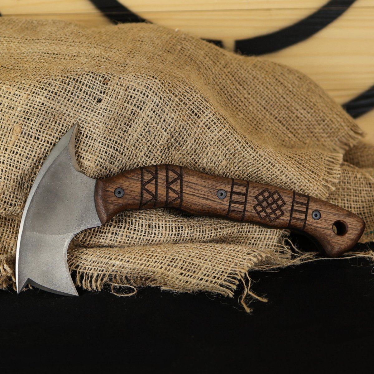 Forged tomahawk "Skaldrun" with tribal engraving