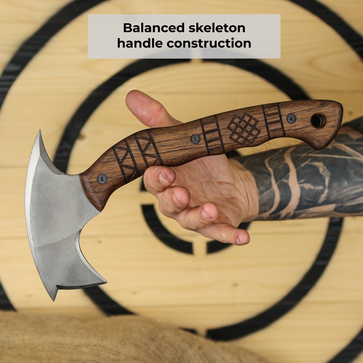 Forged tomahawk "Skaldrun" with tribal engraving